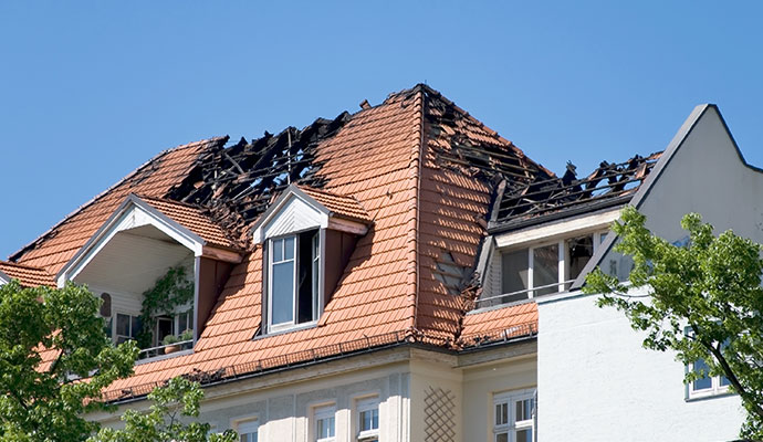Fire-damaged residential roof