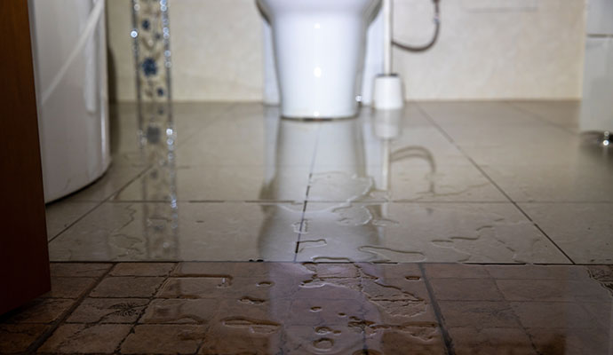 Flooded bathroom floor