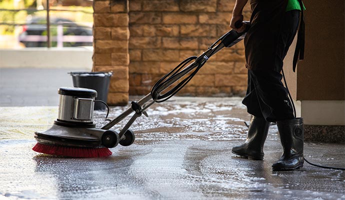 Professional cleaning floor with machine