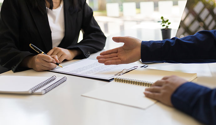Insurance claims assistance contract signing