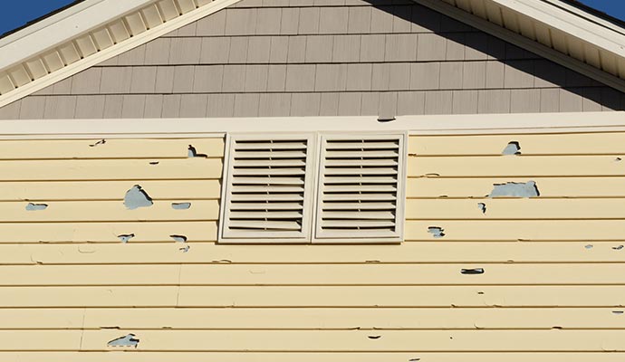 Hail damaged house