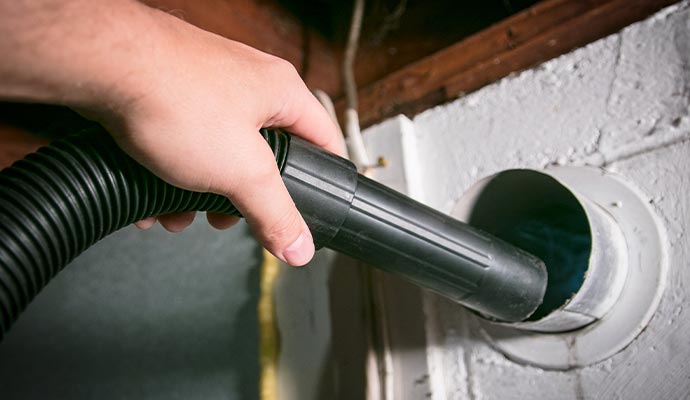 A person sucking from duct vent A person sucking from duct vent