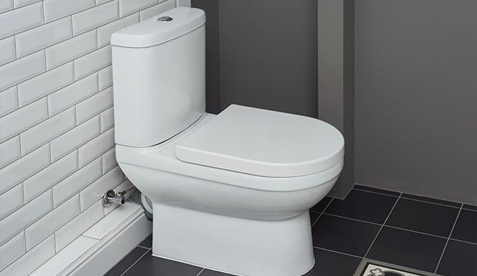 Clean toilet after overflow cleanup