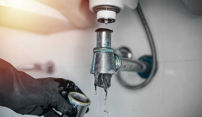Clogged drain causing water to overflow