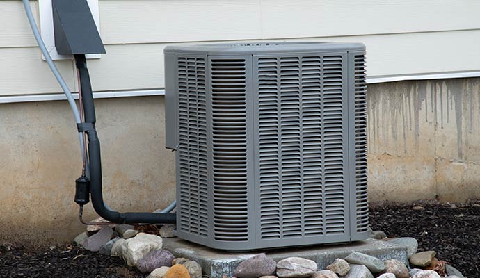 Outdoor central AC unit installation.